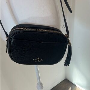 Kate Spade Elegant Black Crossbody Bag with black tassel